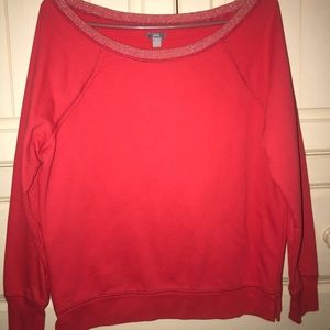 Bright red sweatshirt.